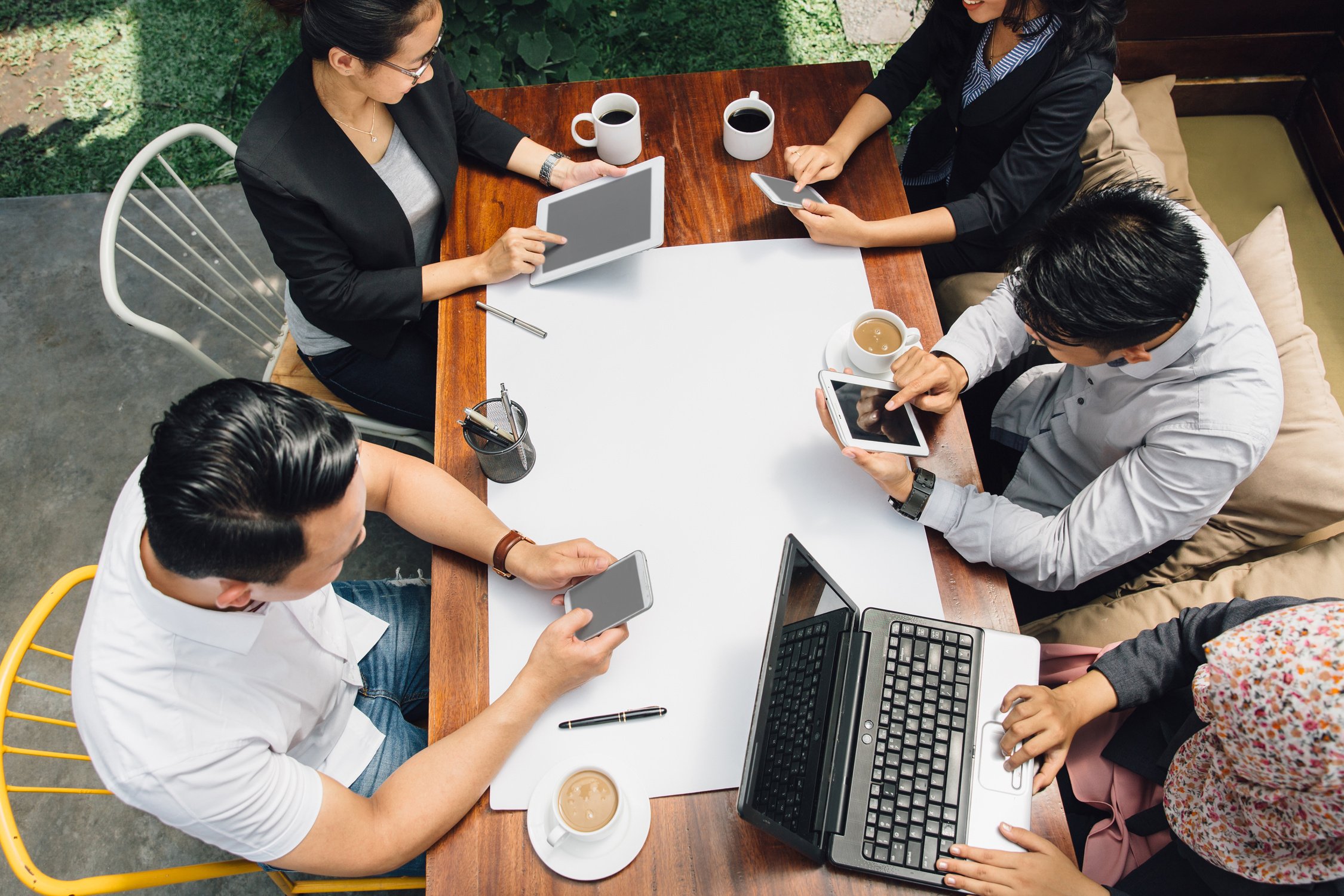 Business People Sitting in Cafe